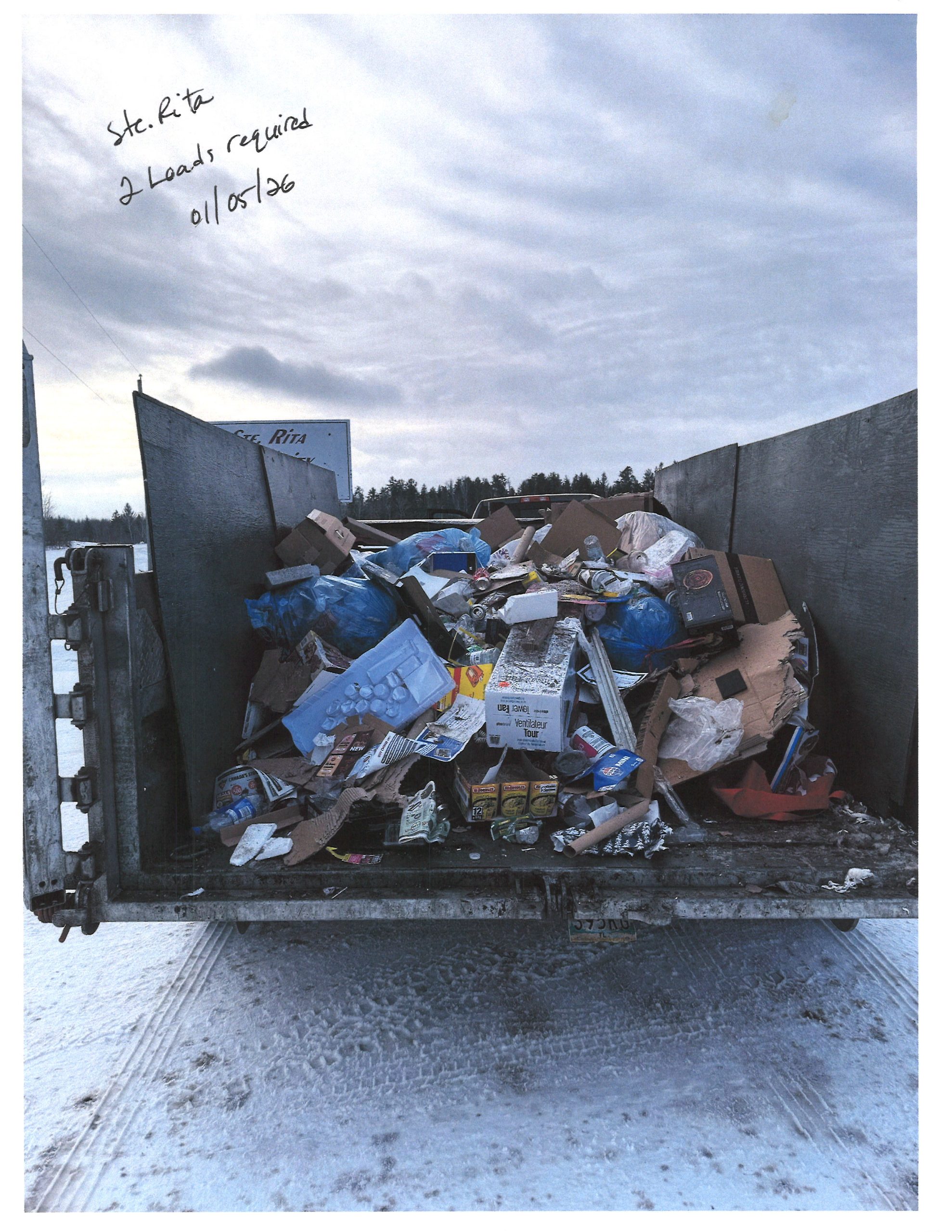 Image of the recycling trailer being filled from the Ste. Rita Recycling shed in January 2026.